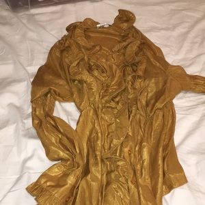 Gold blouse shows off boobies super cuteeee